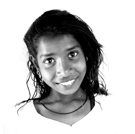 Black-and-white portrait of a young girl in Punjab